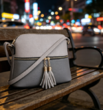 Lightweight Medium Dome Crossbody Bag with Tassel, Zip Pocket and Adjustable Strap